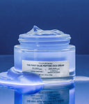 1% Blue Peptide Cica Cream open jar showing blue watery cream texture
