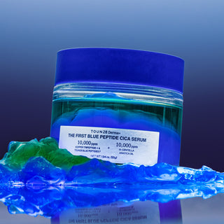1% Blue Peptide Cica Serum jar with blue water gel and green oil gel texture